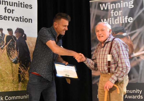 Nick Acheson presenting the lifetime achievement award to Chris Knights. 